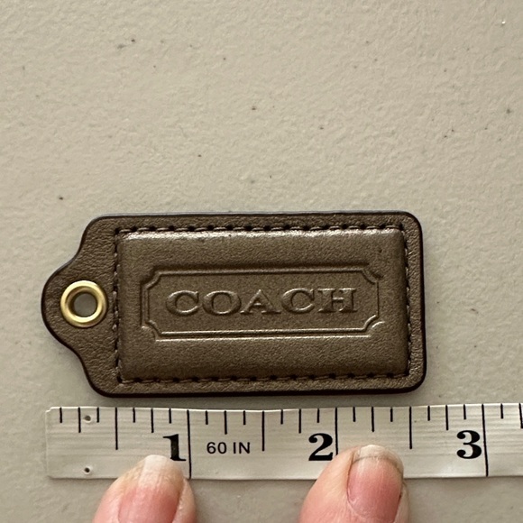 Coach Accessories - Coach Bronze Color Hang Tag